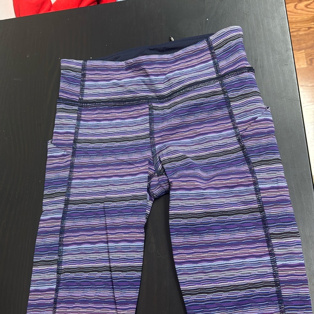 Lululemon size 2 purple stripe leggings with pockets